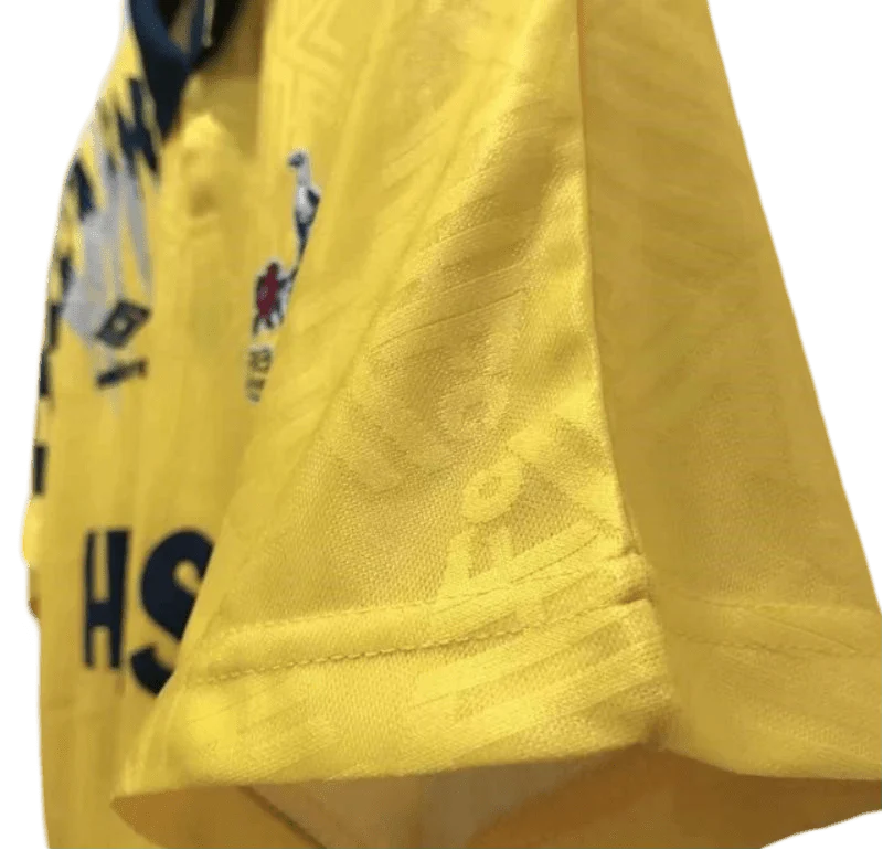 https://cdn.shopify.com/s/files/1/0826/7228/8075/files/19921995-tottenham-hotspur-holsten-yellow-away-retro-kit-classickits433-316323.webp?v=1741199150