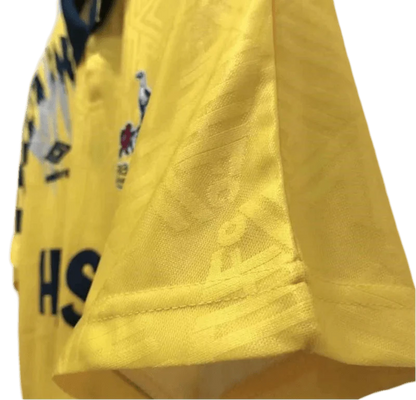 https://cdn.shopify.com/s/files/1/0826/7228/8075/files/19921995-tottenham-hotspur-holsten-yellow-away-retro-kit-classickits433-316323.webp?v=1741199150