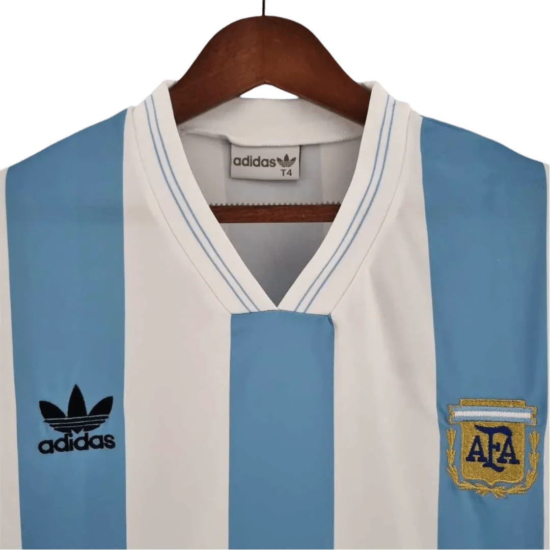https://cdn.shopify.com/s/files/1/0826/7228/8075/files/1993-argentina-home-retro-kit-828908.webp?v=1741197160