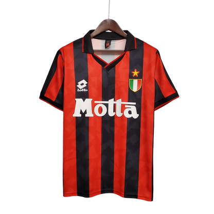https://cdn.shopify.com/s/files/1/0826/7228/8075/files/19931994-ac-milan-lotto-motta-home-retro-kit-classickits433-127409.webp?v=1741198900