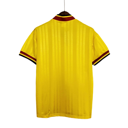 https://cdn.shopify.com/s/files/1/0826/7228/8075/files/19931994-arsenal-jvc-yellow-away-retro-kit-classickits433-292191.webp?v=1741199342