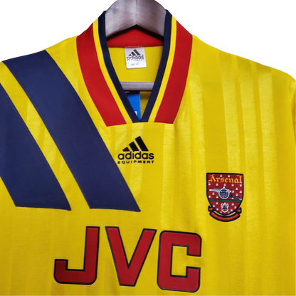 https://cdn.shopify.com/s/files/1/0826/7228/8075/files/19931994-arsenal-jvc-yellow-away-retro-kit-classickits433-528549.webp?v=1741199346