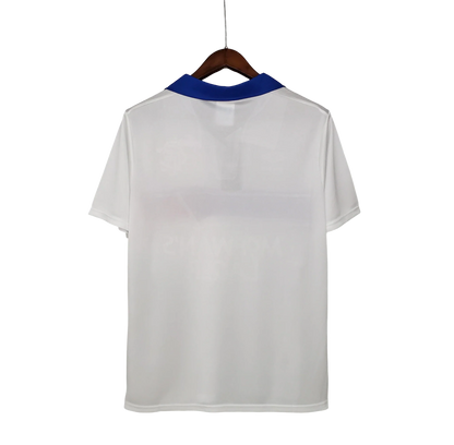 https://cdn.shopify.com/s/files/1/0826/7228/8075/files/19931994-glasgow-rangers-mcewans-lager-away-kit-classickits433-471792.webp?v=1741199135