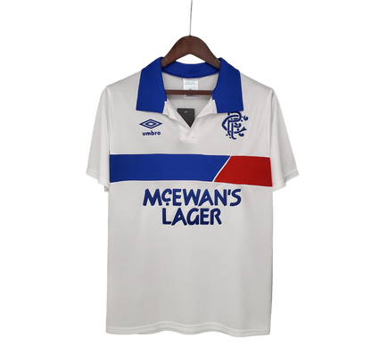 https://cdn.shopify.com/s/files/1/0826/7228/8075/files/19931994-glasgow-rangers-mcewans-lager-away-kit-classickits433-887799.webp?v=1741199135