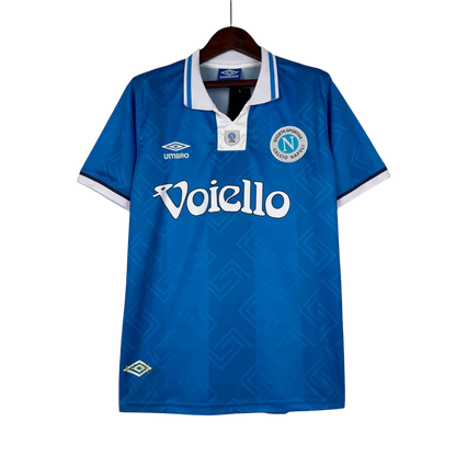 https://cdn.shopify.com/s/files/1/0826/7228/8075/files/19931994-napoli-maradona-shirt-voiello-home-retro-kit-207368.webp?v=1741198898