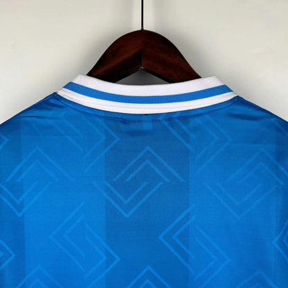 https://cdn.shopify.com/s/files/1/0826/7228/8075/files/19931994-napoli-maradona-shirt-voiello-home-retro-kit-383462.webp?v=1741198901