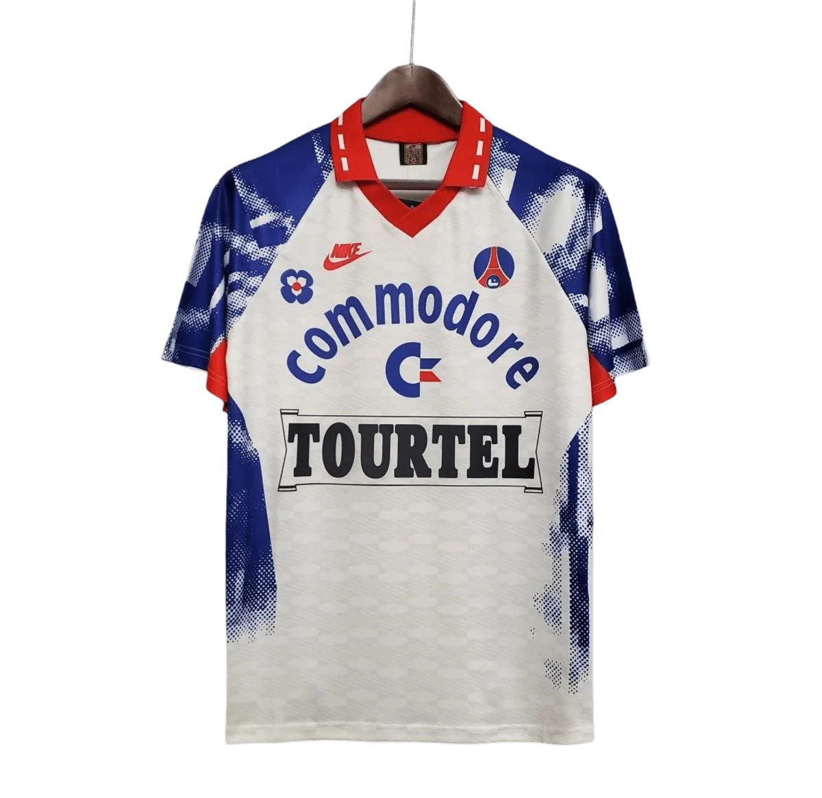https://cdn.shopify.com/s/files/1/0826/7228/8075/files/19931994-paris-saint-germain-commodore-away-white-retro-457661.webp?v=1741199392