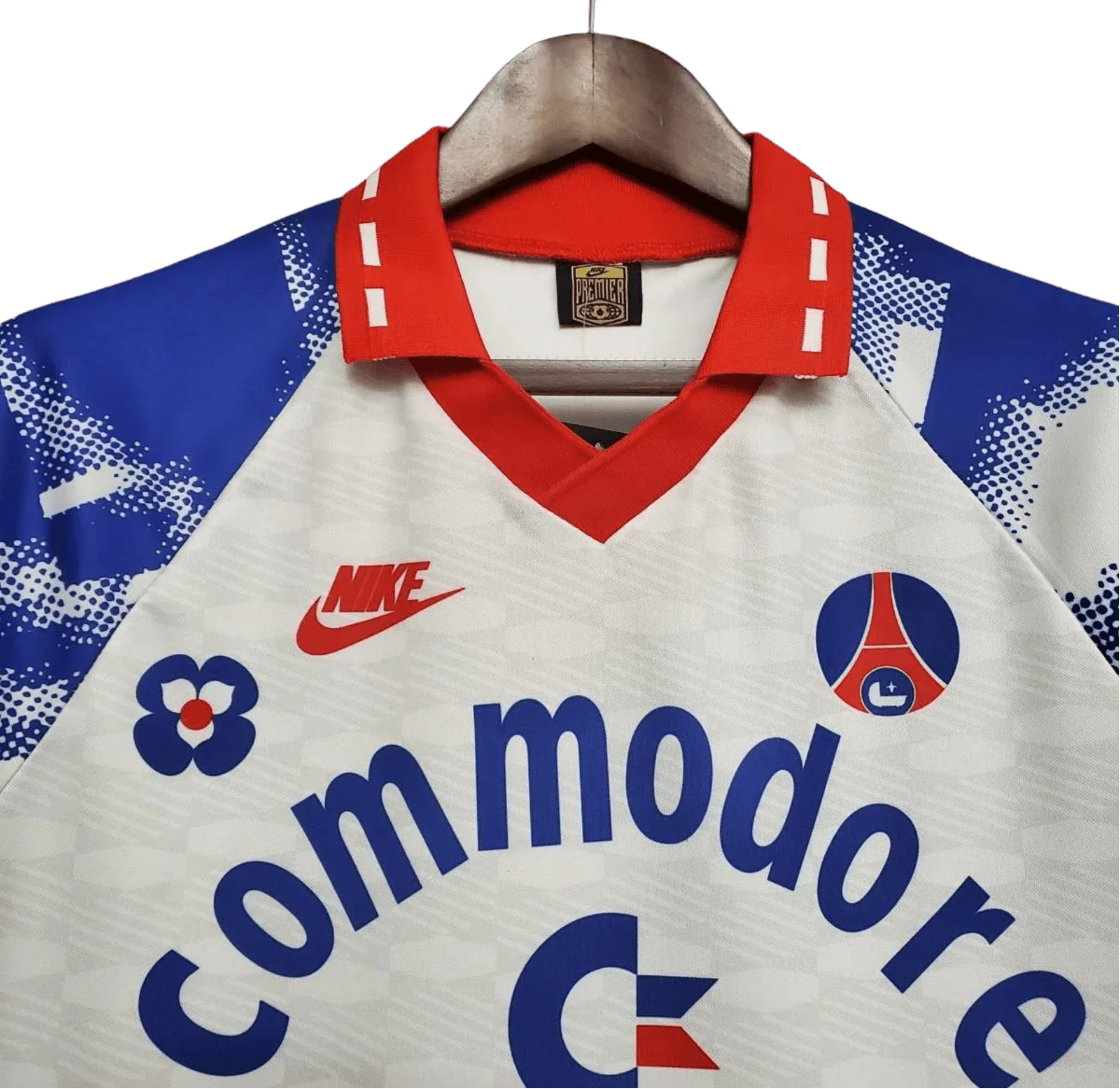 https://cdn.shopify.com/s/files/1/0826/7228/8075/files/19931994-paris-saint-germain-commodore-away-white-retro-502544.webp?v=1741199394