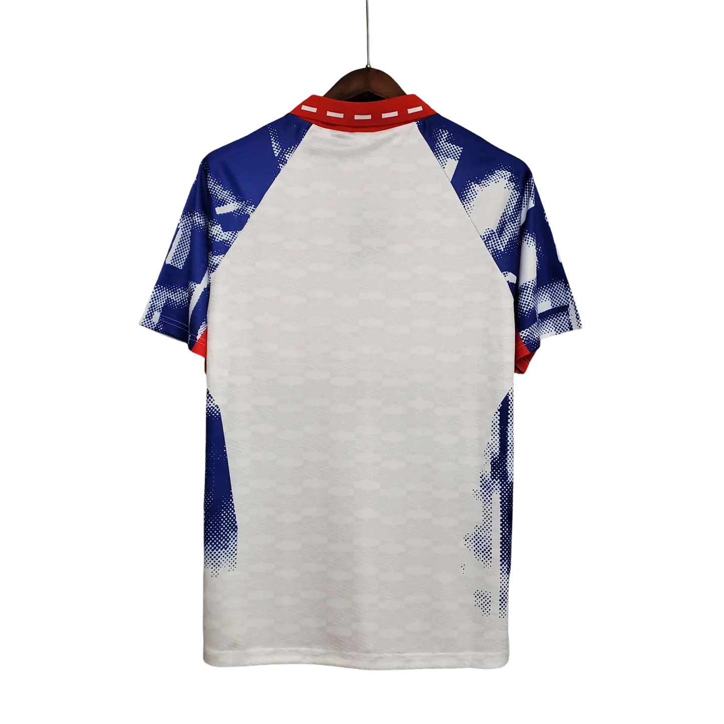 https://cdn.shopify.com/s/files/1/0826/7228/8075/files/19931994-paris-saint-germain-commodore-away-white-retro-756711.webp?v=1741199393