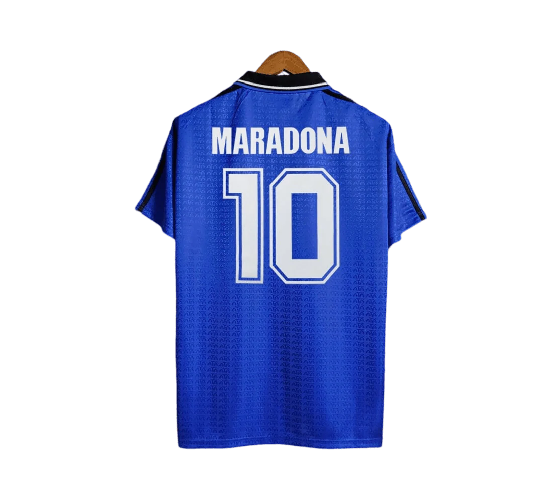 https://cdn.shopify.com/s/files/1/0826/7228/8075/files/1994-argentina-world-cup-away-retro-kit-classickits433-306970.webp?v=1741198808