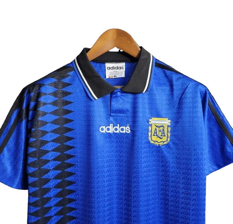 https://cdn.shopify.com/s/files/1/0826/7228/8075/files/1994-argentina-world-cup-away-retro-kit-classickits433-926551.webp?v=1741198808