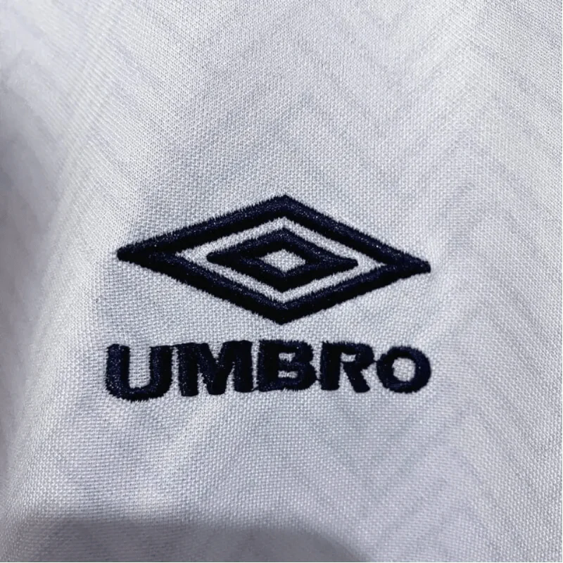 https://cdn.shopify.com/s/files/1/0826/7228/8075/files/1994-england-home-retro-kit-843018.webp?v=1741196947