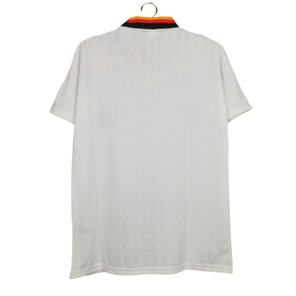 https://cdn.shopify.com/s/files/1/0826/7228/8075/files/1994-germany-world-cup-first-retro-kit-401737.webp?v=1741197023