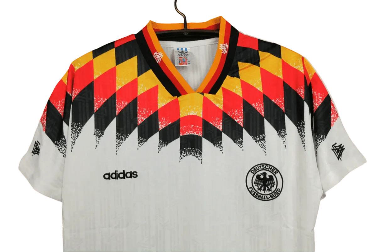 https://cdn.shopify.com/s/files/1/0826/7228/8075/files/1994-germany-world-cup-first-retro-kit-462168.webp?v=1741197026