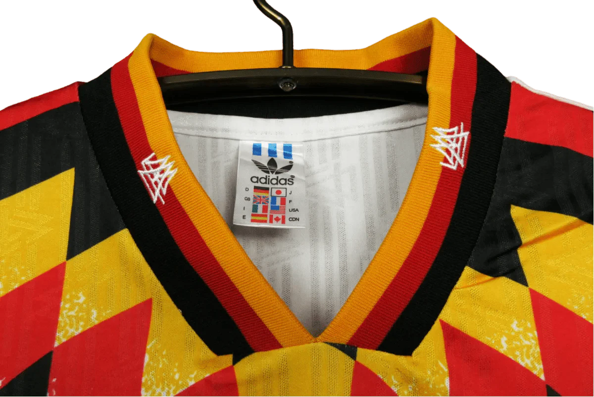 https://cdn.shopify.com/s/files/1/0826/7228/8075/files/1994-germany-world-cup-first-retro-kit-543298.webp?v=1741197022