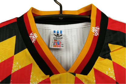 https://cdn.shopify.com/s/files/1/0826/7228/8075/files/1994-germany-world-cup-first-retro-kit-543298.webp?v=1741197022