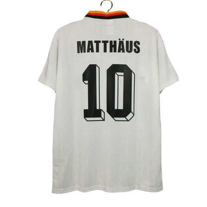 https://cdn.shopify.com/s/files/1/0826/7228/8075/files/1994-germany-world-cup-first-retro-kit-666543.webp?v=1741197021