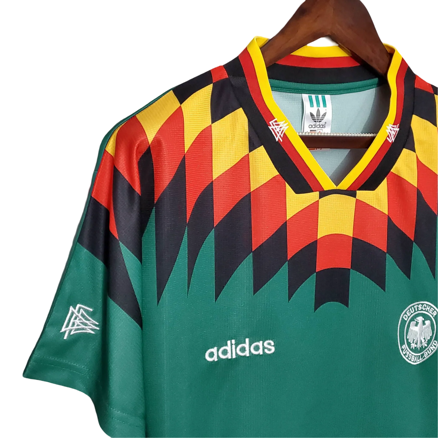 https://cdn.shopify.com/s/files/1/0826/7228/8075/files/1994-germany-world-cup-second-retro-kit-422869.webp?v=1741197039