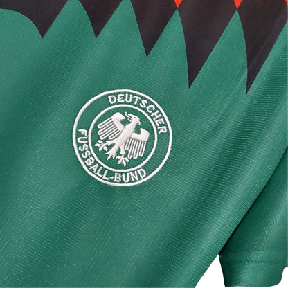 https://cdn.shopify.com/s/files/1/0826/7228/8075/files/1994-germany-world-cup-second-retro-kit-612096.webp?v=1741197039