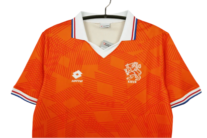 https://cdn.shopify.com/s/files/1/0826/7228/8075/files/1994-netherlands-home-retro-kit-603231.webp?v=1741196966