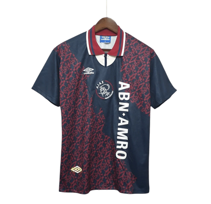 https://cdn.shopify.com/s/files/1/0826/7228/8075/files/19941995-ajax-abn-amro-away-retro-kit-classickits433-198949.webp?v=1741199359