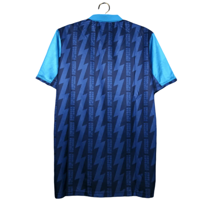 https://cdn.shopify.com/s/files/1/0826/7228/8075/files/19941995-arsenal-jvc-blue-away-retro-kit-classickits433-202074.webp?v=1741198352