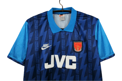 https://cdn.shopify.com/s/files/1/0826/7228/8075/files/19941995-arsenal-jvc-blue-away-retro-kit-classickits433-453160.webp?v=1741198354