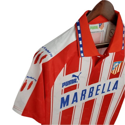 https://cdn.shopify.com/s/files/1/0826/7228/8075/files/19941995-atletico-madrid-marbella-home-retro-kit-classickits433-335030.webp?v=1741199013