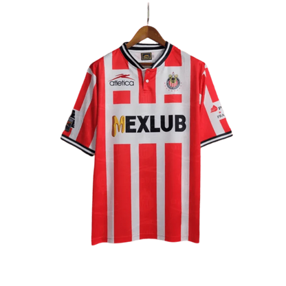https://cdn.shopify.com/s/files/1/0826/7228/8075/files/19941995-chivas-guadalajara-mexlub-home-retro-jersey-525721.webp?v=1741197157