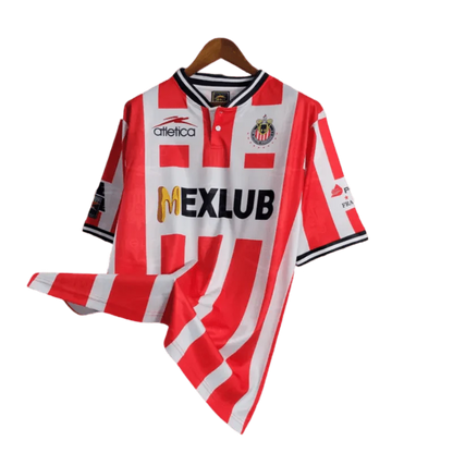 https://cdn.shopify.com/s/files/1/0826/7228/8075/files/19941995-chivas-guadalajara-mexlub-home-retro-jersey-893805.webp?v=1741197157