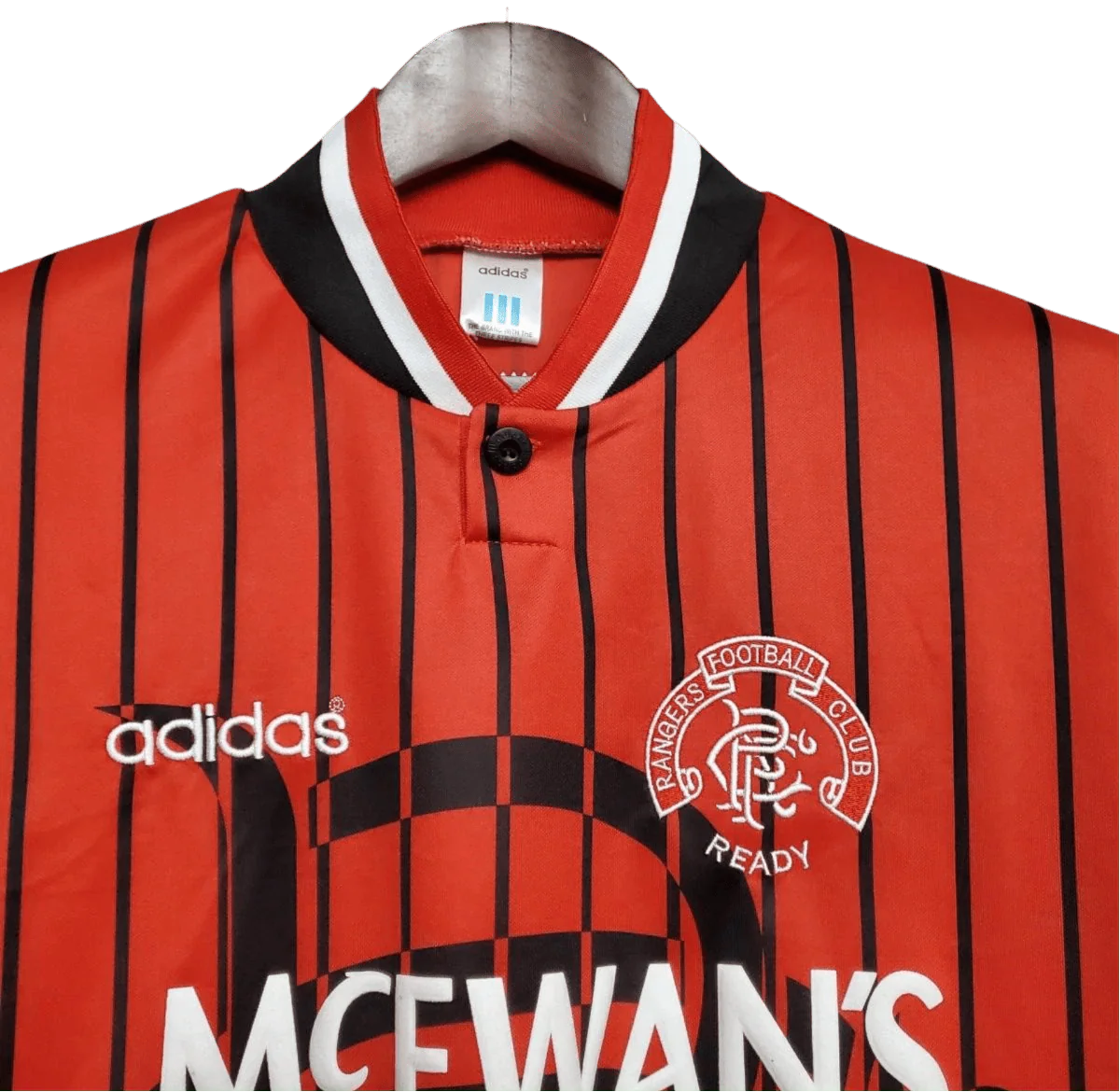 https://cdn.shopify.com/s/files/1/0826/7228/8075/files/19941995-glasgow-rangers-mcewans-lager-away-kit-classickits433-218415.webp?v=1741199134