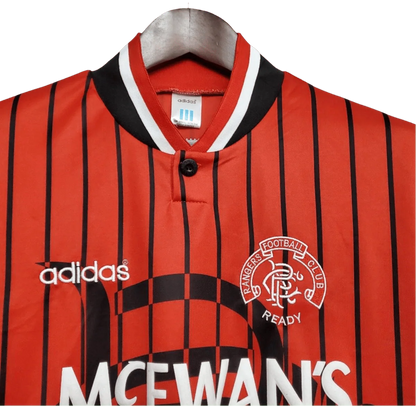https://cdn.shopify.com/s/files/1/0826/7228/8075/files/19941995-glasgow-rangers-mcewans-lager-away-kit-classickits433-218415.webp?v=1741199134