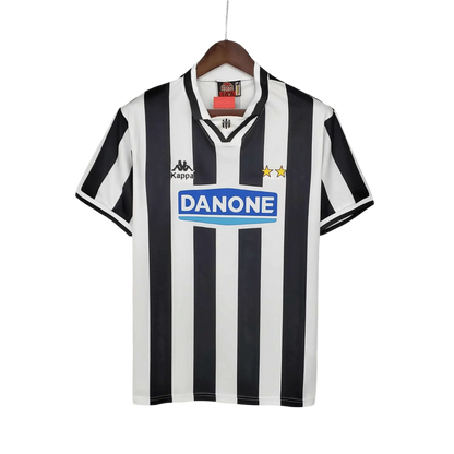 https://cdn.shopify.com/s/files/1/0826/7228/8075/files/19941995-juventus-danone-home-retro-kit-320180.webp?v=1741197287