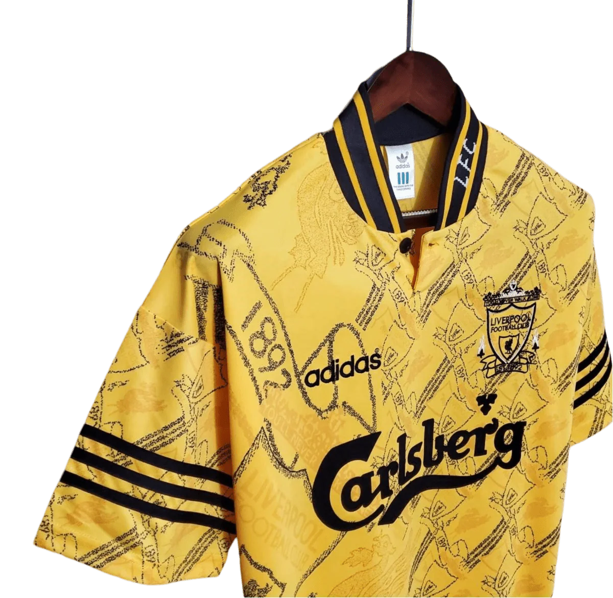 https://cdn.shopify.com/s/files/1/0826/7228/8075/files/19941995-liverpool-carlsberg-yellow-third-retro-kit-classickits433-317025.webp?v=1741199191