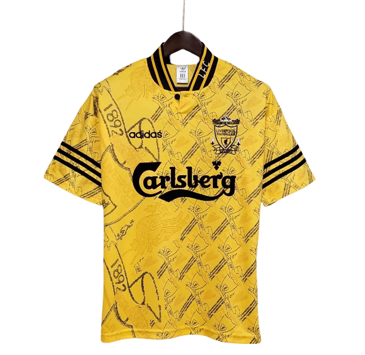 https://cdn.shopify.com/s/files/1/0826/7228/8075/files/19941995-liverpool-carlsberg-yellow-third-retro-kit-classickits433-643441.webp?v=1741199191