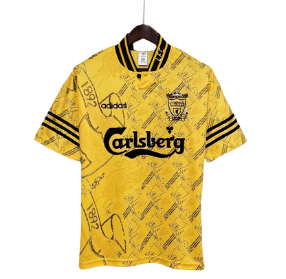 https://cdn.shopify.com/s/files/1/0826/7228/8075/files/19941995-liverpool-carlsberg-yellow-third-retro-kit-classickits433-643441.webp?v=1741199191