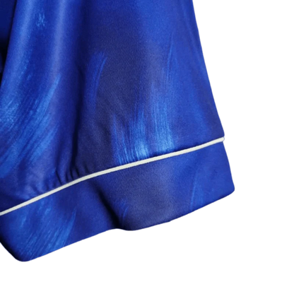 https://cdn.shopify.com/s/files/1/0826/7228/8075/files/19941995-newcastle-utd-mcewans-blue-away-retro-kit-classickits433-600127.webp?v=1741199138