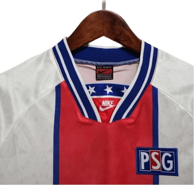 https://cdn.shopify.com/s/files/1/0826/7228/8075/files/19941995-paris-saint-germain-away-white-retro-jersey-534062.webp?v=1741199359