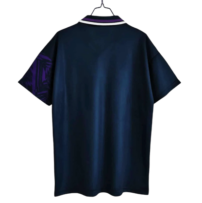 https://cdn.shopify.com/s/files/1/0826/7228/8075/files/19941995-tottenham-hotspur-holsten-blue-away-retro-kit-classickits433-674374.webp?v=1741199155