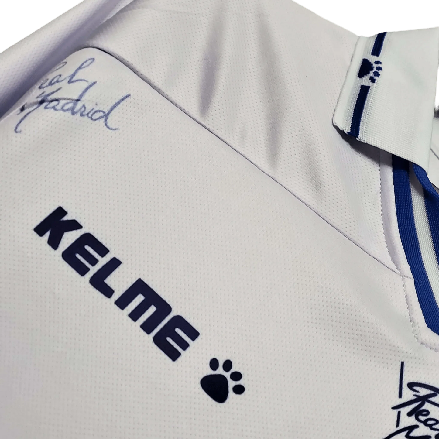 https://cdn.shopify.com/s/files/1/0826/7228/8075/files/19941996-real-madrid-teka-home-retro-kit-220040.webp?v=1741197465
