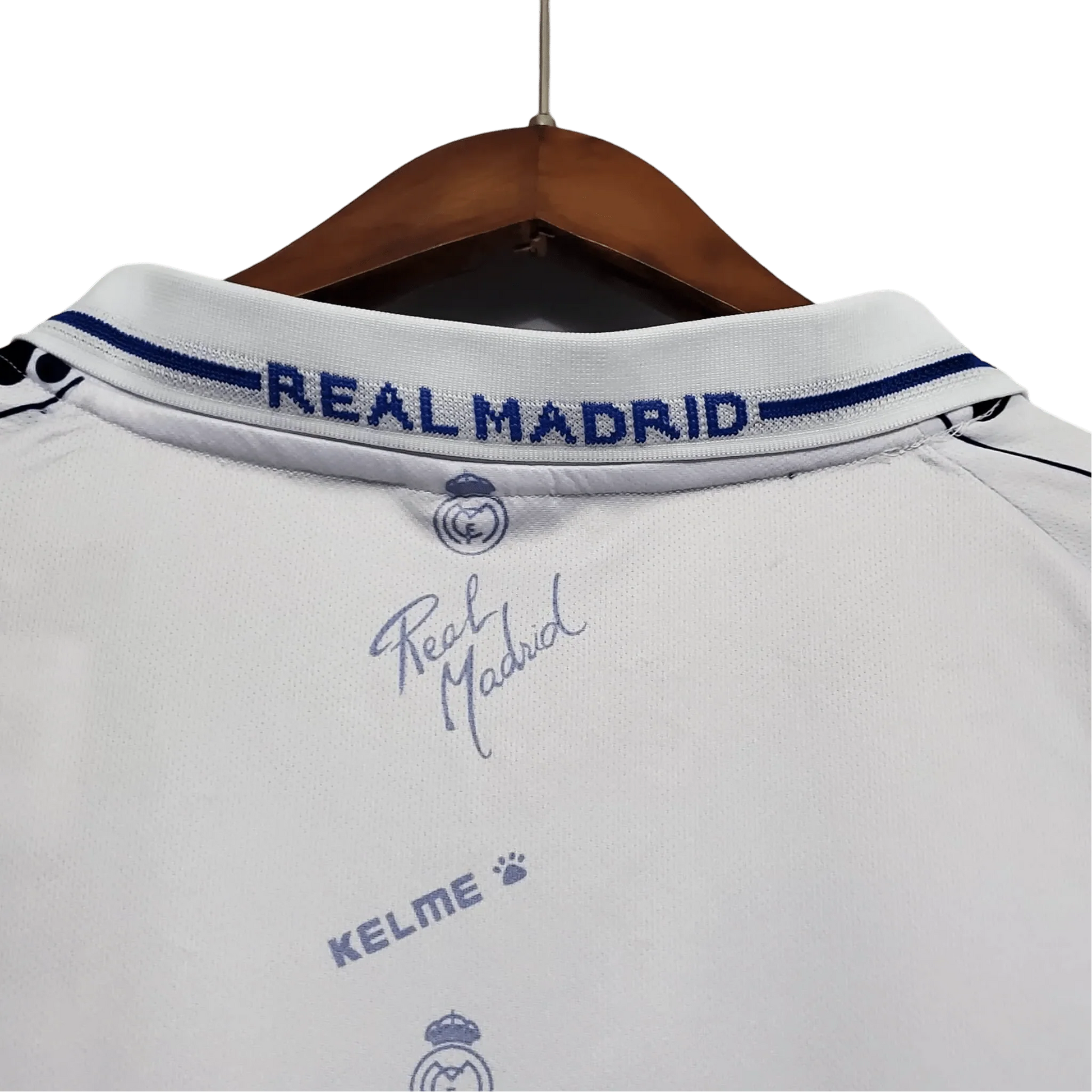 https://cdn.shopify.com/s/files/1/0826/7228/8075/files/19941996-real-madrid-teka-home-retro-kit-434563.webp?v=1741197467