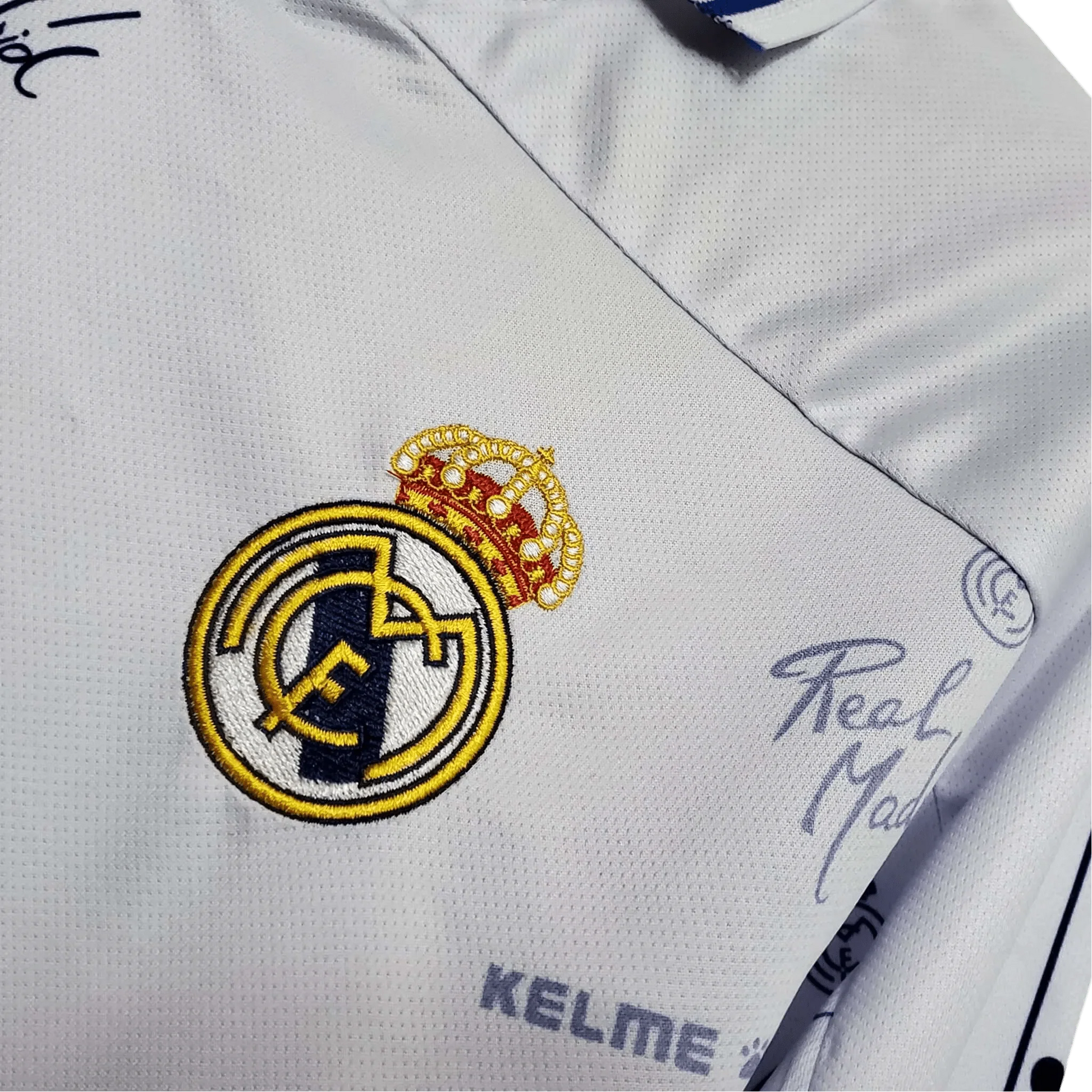 https://cdn.shopify.com/s/files/1/0826/7228/8075/files/19941996-real-madrid-teka-home-retro-kit-492117.webp?v=1741197466