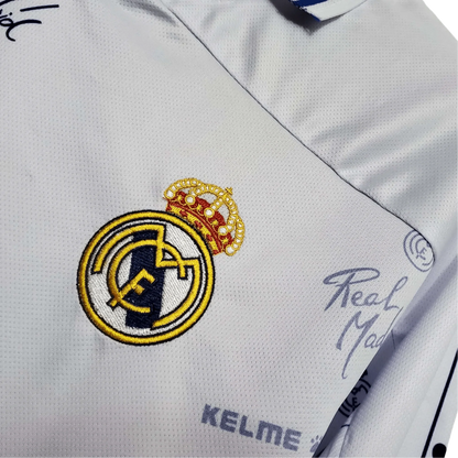 https://cdn.shopify.com/s/files/1/0826/7228/8075/files/19941996-real-madrid-teka-home-retro-kit-492117.webp?v=1741197466