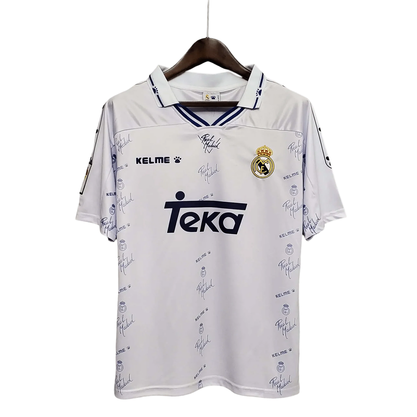https://cdn.shopify.com/s/files/1/0826/7228/8075/files/19941996-real-madrid-teka-home-retro-kit-500979.webp?v=1741197465
