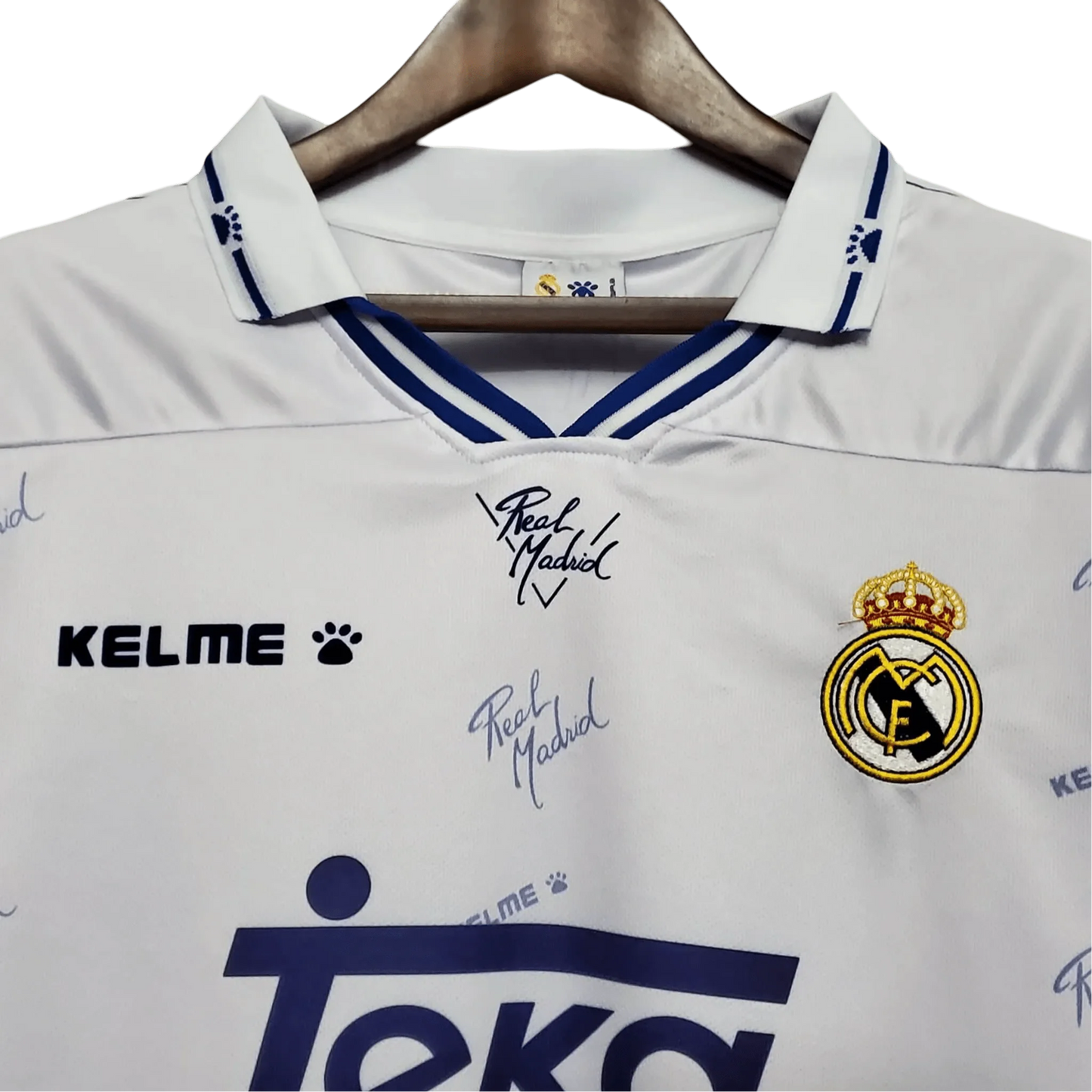 https://cdn.shopify.com/s/files/1/0826/7228/8075/files/19941996-real-madrid-teka-home-retro-kit-752192.webp?v=1741197463
