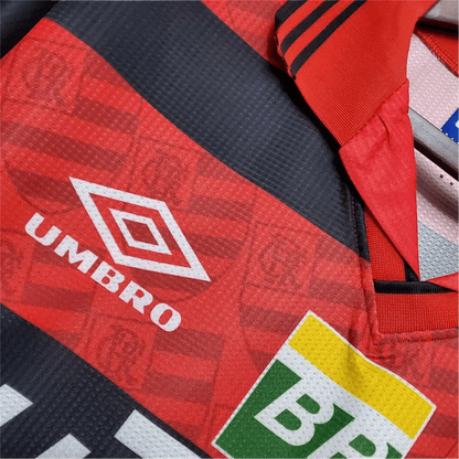 https://cdn.shopify.com/s/files/1/0826/7228/8075/files/1995-flamengo-fc-lubrax-home-retro-jersey-271162.webp?v=1741197185