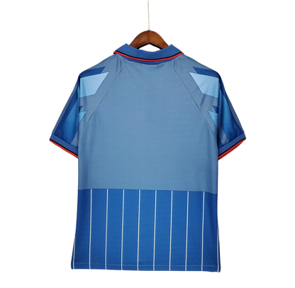 https://cdn.shopify.com/s/files/1/0826/7228/8075/files/19951996-ac-milan-lotto-opel-third-retro-kit-classickits433-273504.webp?v=1741198900
