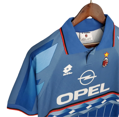 https://cdn.shopify.com/s/files/1/0826/7228/8075/files/19951996-ac-milan-lotto-opel-third-retro-kit-classickits433-547356.webp?v=1741198900