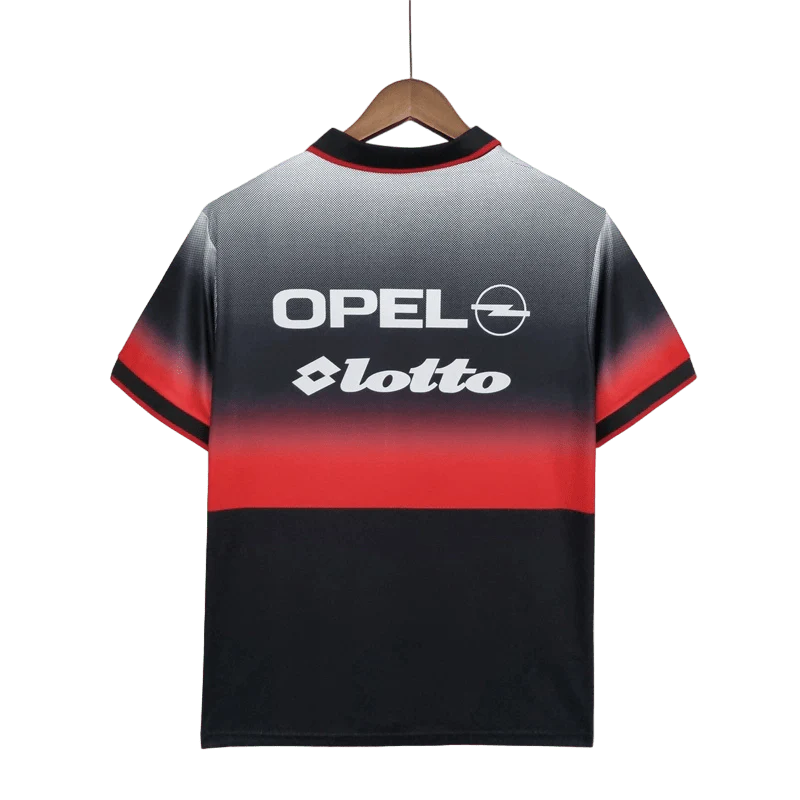 https://cdn.shopify.com/s/files/1/0826/7228/8075/files/19951996-ac-milan-opel-training-black-retro-kit-classickits433-486151.webp?v=1741198815