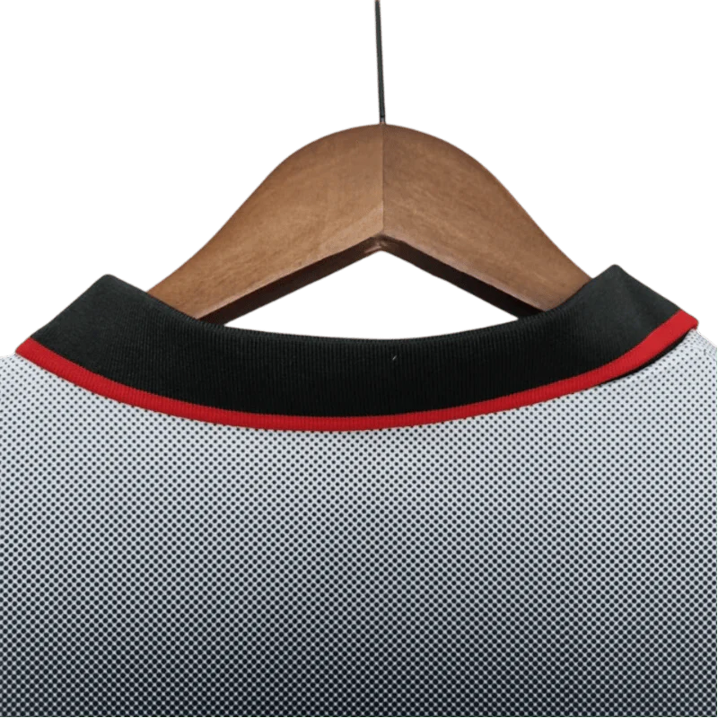https://cdn.shopify.com/s/files/1/0826/7228/8075/files/19951996-ac-milan-opel-training-black-retro-kit-classickits433-663971.webp?v=1741198817